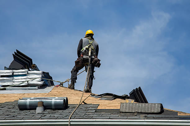 Professional Roof Replacement technician working in Lee, NH